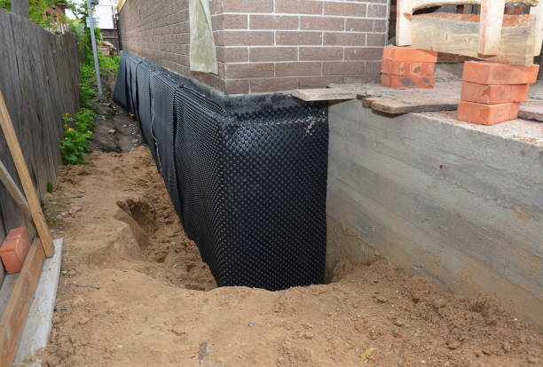SJ Waterproofing Pros technician performing targeted Foundation Crack Repair assessment in Warren, IN
